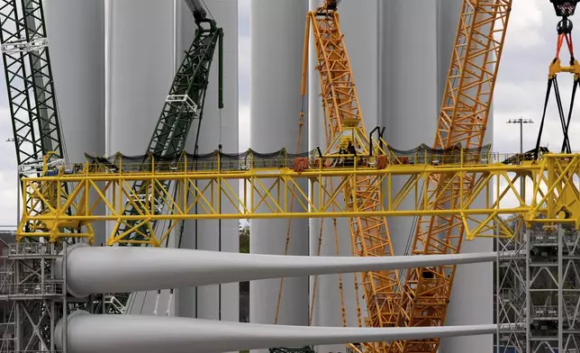 FILE - Wind turbine components sit at New London State Pier, April 16, 2025, in New London, Conn. (AP Photo/Julia Demaree Nikhinson, File)