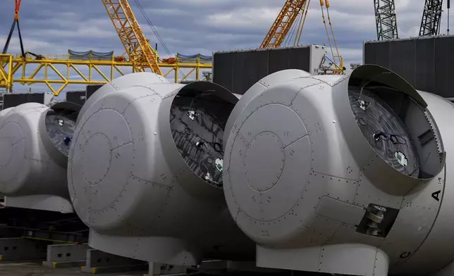 FILE - Wind turbine components sit at New London State Pier, April 16, 2025, in New London, Conn. (AP Photo/Julia Demaree Nikhinson, File)