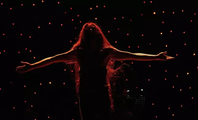 Alexandre Paulikevitch performs on stage at a theatre in Beirut, Lebanon, Thursday, Sept. 11, 2025. (AP Photo/Hussein Malla)