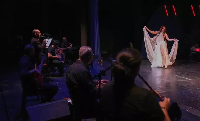 Alexandre Paulikevitch performs at a theatre in Beirut, Lebanon, Thursday, Sept. 11, 2025. (AP Photo/Hussein Malla)