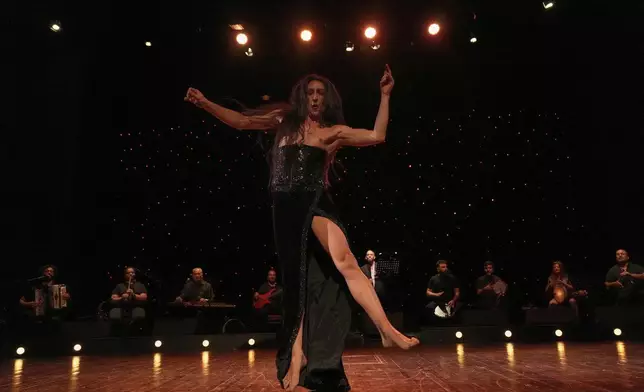 Alexandre Paulikevitch performs at a theatre in Beirut, Lebanon, Thursday, Sept. 11, 2025. (AP Photo/Hussein Malla)