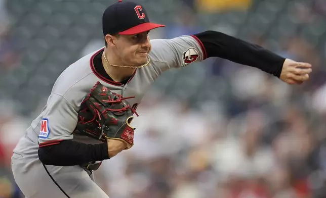 Cleveland Guardians pitcher Logan Allen (26) works against the Minnesota Twins in the first inning of the second baseball game of a doubleheader, Saturday, Sept. 20, 2025, in Minneapolis. (AP Photo/Mike Stewart)