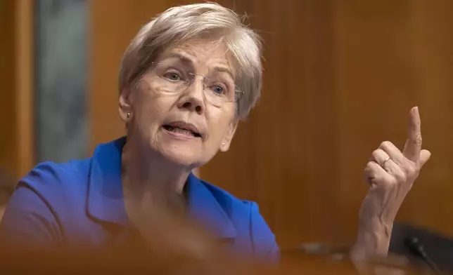 Sen. Elizabeth Warren, D-Mass., speaks as Secretary of Health and Human Services Robert F. Kennedy Jr., appears before the Senate Finance Committee, on Capitol Hill in Washington, Thursday, Sept. 4, 2025. (AP Photo/Mark Schiefelbein)