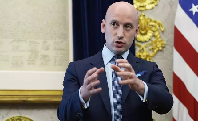 Stephen Miller, White House deputy chief of staff, speaks during a memorandum signing with President Donald Trump in the Oval Office of the White House, Monday, Sept. 15, 2025, in Washington. (AP Photo/Alex Brandon)
