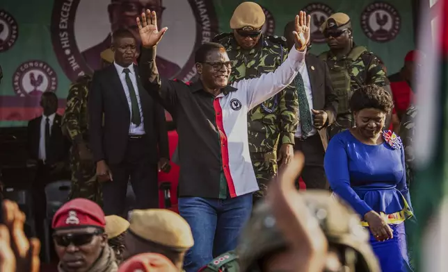 Malawi Congress Party (MCP) leader and Malawian President Lazarus Chakwera waves at supporters at a campaign rally in Blantyre, Malawi, Sunday, Sept. 7, 2025. (AP Photo/Thoko Chikondi)