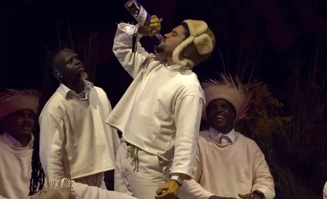 Bad Bunny performs during the final concert of his summer residency in his homeland at the Coliseo de Puerto Rico Jose Miguel Agrelot, in San Juan, Puerto Rico, Saturday, Sept. 20, 2025. (AP Photo/Alejandro Granadillo)