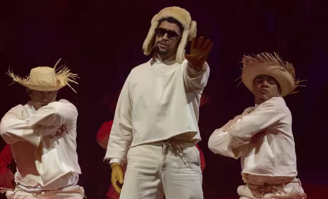 Bad Bunny performs during the final concert of his summer residency in his homeland at the Coliseo de Puerto Rico Jose Miguel Agrelot, in San Juan, Puerto Rico, Saturday, Sept. 20, 2025. (AP Photo/Alejandro Granadillo)