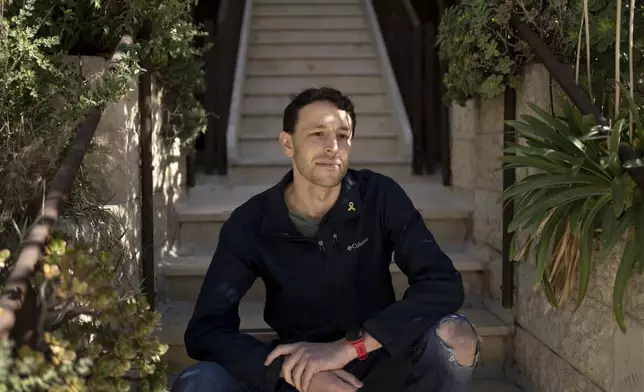 FILE - Max Kresch, an army reserve medic who has joined a growing number of Israeli soldiers speaking out against the conflict in Gaza and refusing to continue fighting, poses for a portrait in Jerusalem on Jan. 9, 2025. (AP Photo/Maya Alleruzzo, File)