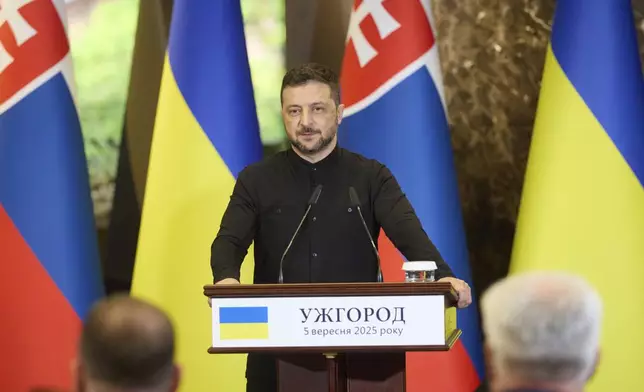 In this photo provided by the Ukrainian Presidential Press Office, Ukrainian President Volodymyr Zelenskyy talk during joint press conference with Prime Minister of Slovakia Robert in Uzhhorod, Ukraine, Friday, Sept. 5 2025. (Ukrainian Presidential Press Office via AP)