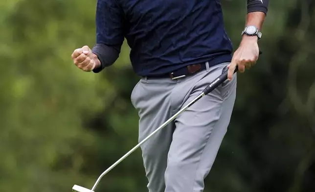 Angel Hidalgo reacts after making par on the 17th hole during the third round of the Irish Open golf tournament, Saturday, Sept. 6, 2025, at The K Club in Straffan, Ireland. (Brian Lawless/PA via AP)