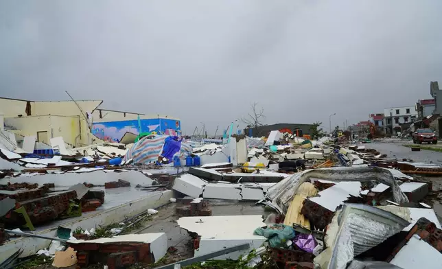 Buildings are seen collapsed to the ground after Typhoon Bualoi swept through Thanh Hoa, Vietnam, Monday, Sept. 29, 2025. (Viet Hoang/VNExpress via AP)