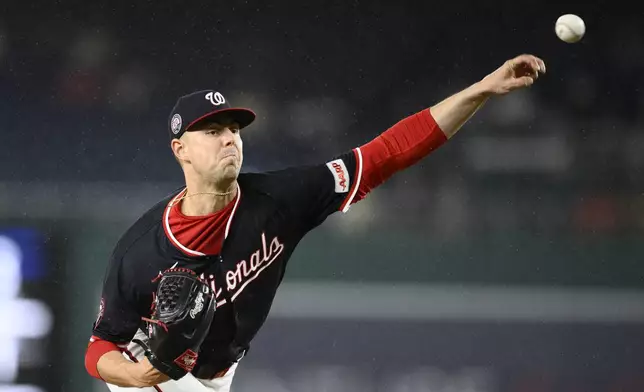 Washington Nationals starting pitcher MacKenzie Gore throws during the first inning of the second baseball game of a doubleheader against the Atlanta Braves, Tuesday, Sept. 16, 2025, in Washington. (AP Photo/Nick Wass)