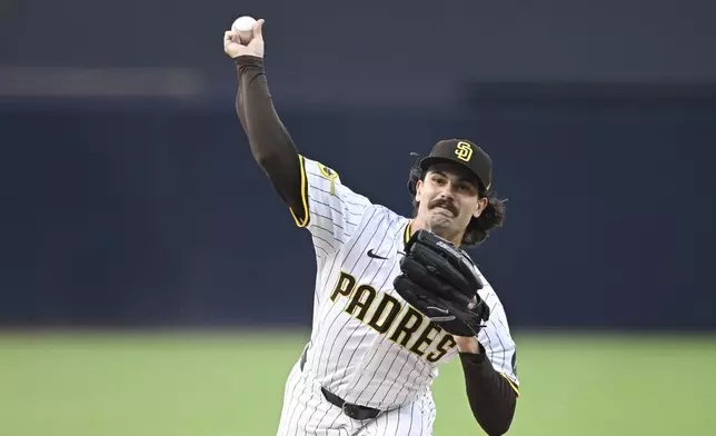 San Diego Padres starting pitcher Dylan Cease delivers during the first inning of a baseball game against the Colorado Rockies, Saturday, Sept. 13, 2025, in San Diego. (AP Photo/Denis Poroy)