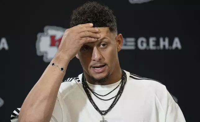 Kansas City Chiefs quarterback Patrick Mahomes speaks during a news conference following an NFL football game against the Philadelphia Eagles Sunday, Sept. 14, 2025, in Kansas City, Mo. (AP Photo/Charlie Riedel)