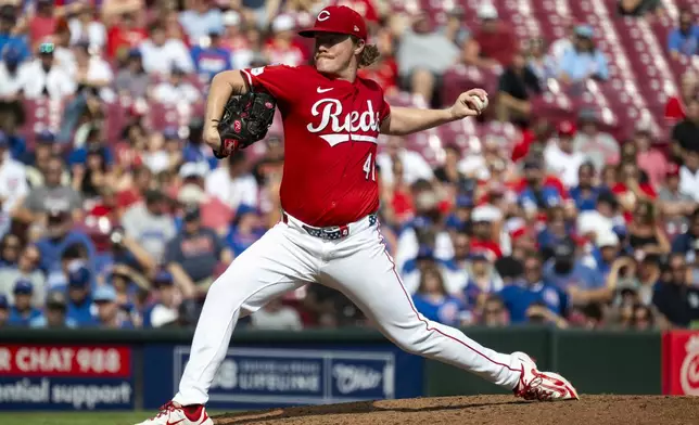 Cincinnati Reds pitcher Andrew Abbott delivers in the third inning of a baseball game against the Chicago Cubs, Sunday, Sept. 21, 2025, in Cincinnati. (AP Photo/Michael Swensen)