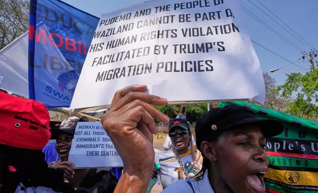 Pro-democracy activists protest outside the U.S. embassy in Pretoria, South Africa, Friday, Sept. 19, 2025. (AP Photo/Themba Hadebe)