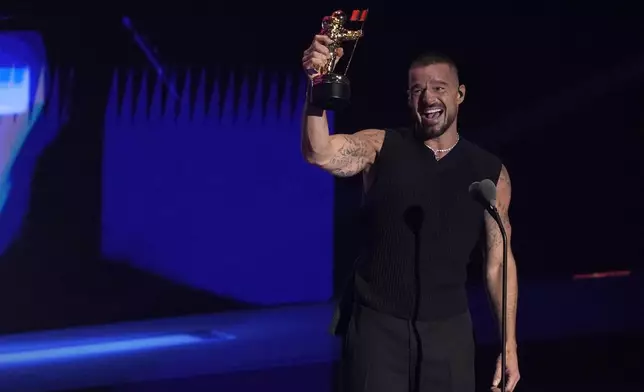 Ricky Martin accepts the latin icon award during the MTV Video Music Awards on Sunday, Sept. 7, 2025, at UBS Arena in Elmont, N.Y. (Photo by Charles Sykes/Invision/AP)