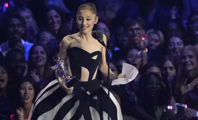 Ariana Grande accepts the award for best pop for "Brighter Days Ahead" during the MTV Video Music Awards on Sunday, Sept. 7, 2025, at UBS Arena in Elmont, N.Y. (Photo by Charles Sykes/Invision/AP)
