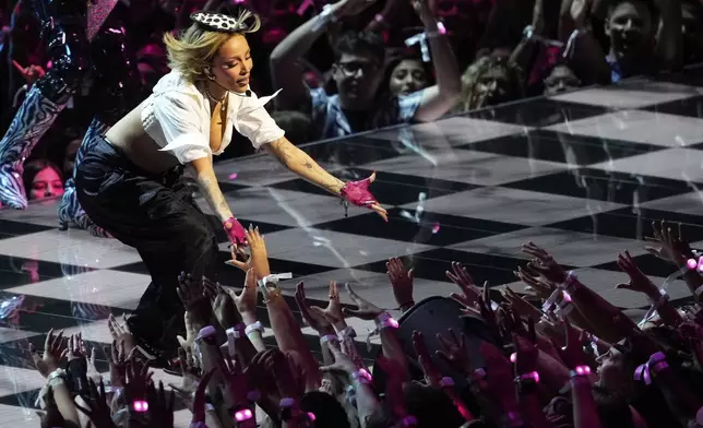 Doja Cat performs "Jealous Type" during the MTV Video Music Awards on Sunday, Sept. 7, 2025, at UBS Arena in Elmont, N.Y. (Photo by Charles Sykes/Invision/AP)