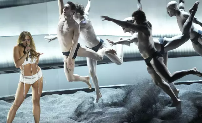 Tate McRae performs "Sports Car" during the MTV Video Music Awards on Sunday, Sept. 7, 2025, at UBS Arena in Elmont, N.Y. (Photo by Charles Sykes/Invision/AP)