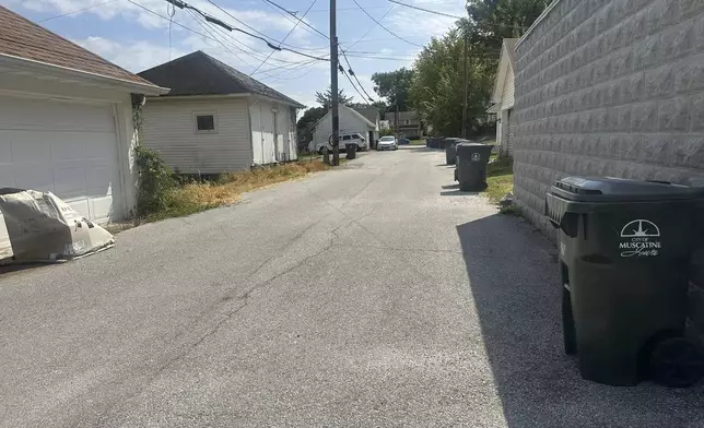 An alley in a residential neighborhood is shown in Muscatine, Iowa, on Sept. 8, 2025, where police say Felipe de Jesus Hernandez Marcelo was lured to the alley before he was shot on June 21. (AP photo by Ryan J. Foley).