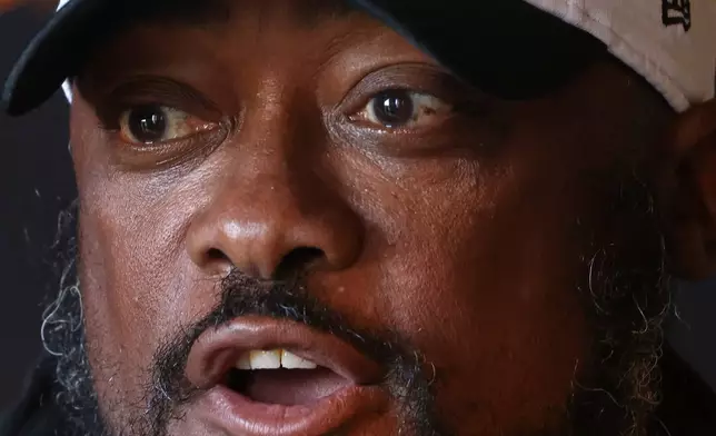 Pittsburgh Steelers head coach Mike Tomlin speaks at a press conference before a training session ahead of their match against Minnesota Vikings in Dublin, Friday, Sept. 26, 2025. (AP Photo/Peter Morrison)