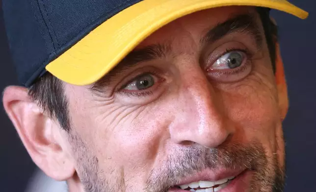 Pittsburgh Steelers quarterback Aaron Rodgers speaks during a press conference prior to a training session ahead of their match against Minnesota Vikings in Dublin, Friday, Sept. 26, 2025. (AP Photo/Peter Morrison)