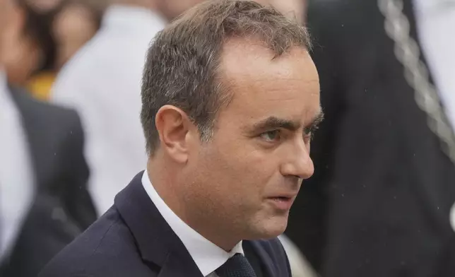 Newly named Prime Minister Sebastien Lecornu arrives at the Prime Minister residence for a handover ceremony with outgoing French Prime Minister Francois Bayrou, in in Paris, Wednesday, Sept. 10, 2025. (AP Photo/Christophe Ena)