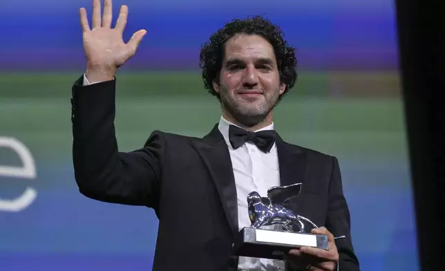 Benny Safdie accepts the Silver Lion for best director for 'The Smashing Machine' during the awards ceremony of the 82nd edition of the Venice Film Festival in Venice, Italy, on Saturday, Sept. 6, 2025. (Photo by Alessandra Tarantino/Invision/AP)