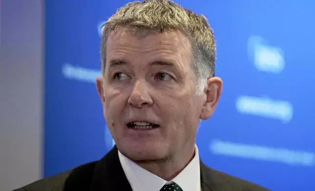 FILE - Richard Moore, the Chief of Britain's Secret Intelligence Service, also known as MI6, answers questions in London, England, Nov. 30, 2021, after giving his first public speech since becoming head of the organization. (AP Photo/Matt Dunham, File)