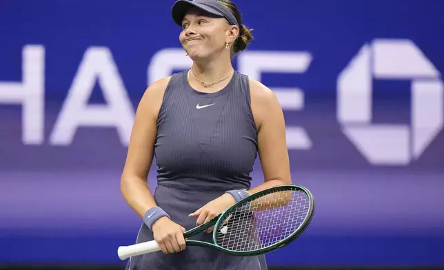 Amanda Anisimova, of the United States, reacts after scoring a point against Aryna Sabalenka, of Belarus, during the women's singles final of the U.S. Open tennis championships, Saturday, Sept. 6, 2025, in New York. (AP Photo/Frank Franklin)