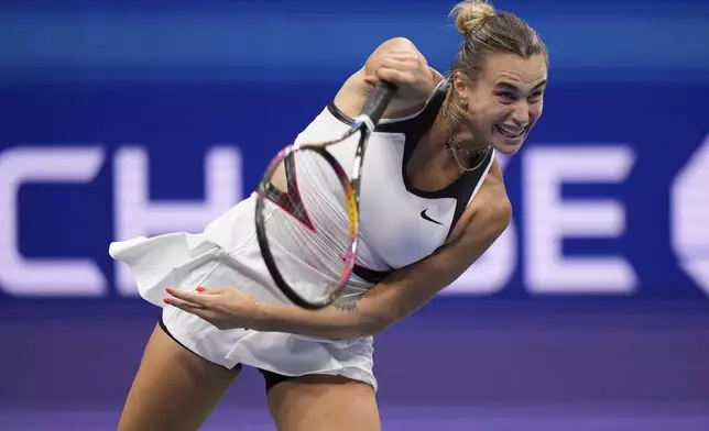 Aryna Sabalenka, of Belarus, serves against Amanda Anisimova, of the United States, during the women's finals of the U.S. Open tennis championships, Saturday, Sept. 6, 2025, in New York. (AP Photo/Frank Franklin)