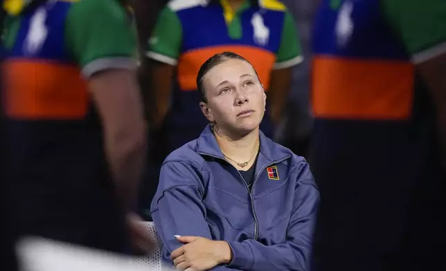 Amanda Anisimova, of the United States, sits on her bench after losing to Aryna Sabalenka, of Belarus, in the women's singles final of the U.S. Open tennis championships, Saturday, Sept. 6, 2025, in New York. (AP Photo/Kirsty Wigglesworth)