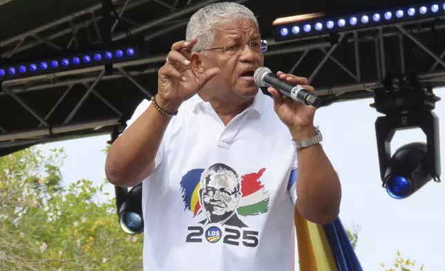 President Wavel Ramkalawan of the Republic of Seychelles and presidential candidate for Linyon Demokratik Seselwa delivers a speech at a campaign rally at Freedom Square in Victoria, Seychelles, Sunday, Sep. 21, 2025. (AP Photo/Emilie Chetty)