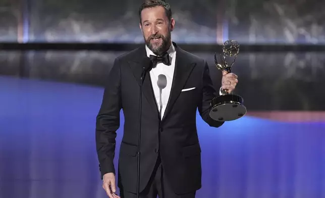 Noah Wyle accepts the award for outstanding lead actor in a drama series for "The Pitt" during the 77th Primetime Emmy Awards on Sunday, Sept. 14, 2025, at the Peacock Theater in Los Angeles. (AP Photo/Chris Pizzello)