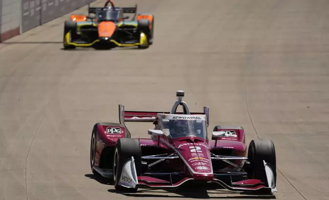 Josef Newgarden (2) drives during an IndyCar auto race Sunday, Aug. 31, 2025, at Nashville Superspeedway in Lebanon, Tenn. (AP Photo/George Walker IV)