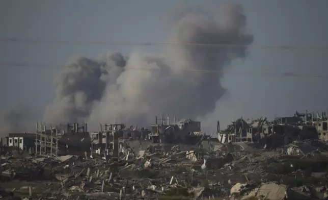 Smoke rises to the sky following an Israeli military strike in the Gaza Strip, as seen from southern Israel, Tuesday, Sept. 16, 2025. (AP Photo/Leo Correa)