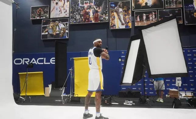 Golden State Warriors guard Gary Payton II poses for photos during the NBA basketball team's media day in San Francisco, Monday, Sept. 29, 2025. (AP Photo/Jeff Chiu)
