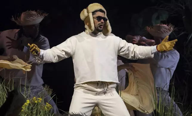 Bad Bunny performs during the final concert of his summer residency in his homeland at the Coliseo de Puerto Rico Jose Miguel Agrelot, in San Juan, Puerto Rico, Saturday, Sept. 20, 2025. (AP Photo/Alejandro Granadillo)