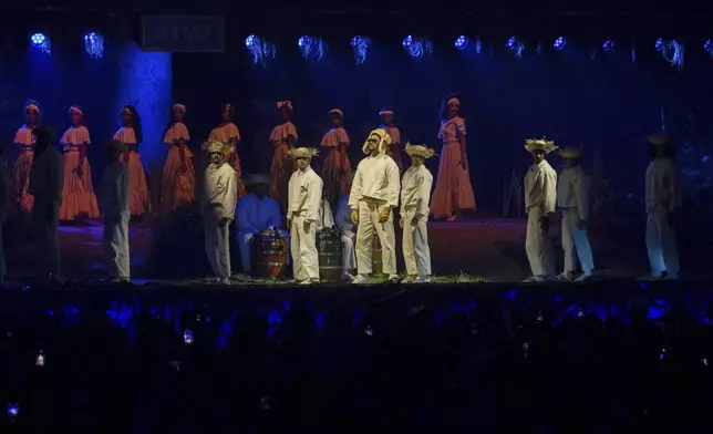 Bad Bunny performs during the final concert of his summer residency in his homeland at the Coliseo de Puerto Rico Jose Miguel Agrelot, in San Juan, Puerto Rico, Saturday, Sept. 20, 2025. (AP Photo/Alejandro Granadillo)
