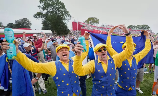 Europe's fans cheer during the opening ceremonies for the Ryder Cup golf tournament, Wednesday, Sept. 24, 2025, on the Bethpage Black golf course, in Farmingdale, N.Y. (AP Photo/Robert Bukaty)