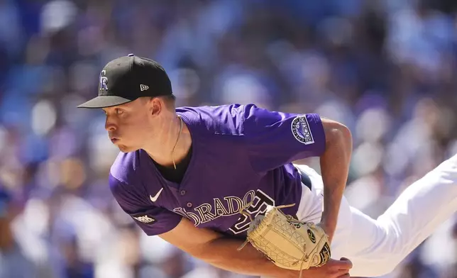 Colorado Rockies starting pitcher Tanner Gordon works against the Chicago Cubs in the sixth inning of a baseball game Sunday, Aug. 31, 2025, in Denver. (AP Photo/David Zalubowski)