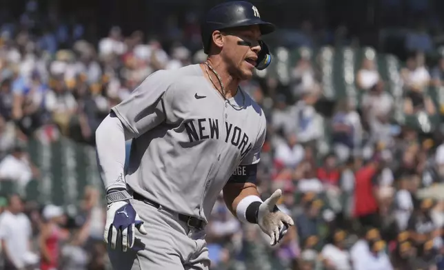 New York Yankees' Aaron Judge rounds the bases after hitting a solo home run during the first inning of a baseball game against the Chicago White Sox in Chicago, Sunday, Aug. 31, 2025. (AP Photo/Nam Y. Huh)