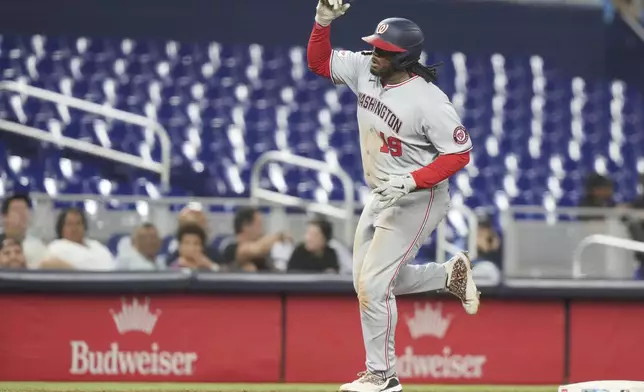 Washington Nationals' Josh Bell (19) runs the bases after hitting a two run home run during the sixth inning of a baseball game against the Miami Marlins, Monday, Sept. 8, 2025, in Miami. (AP Photo/Lynne Sladky)
