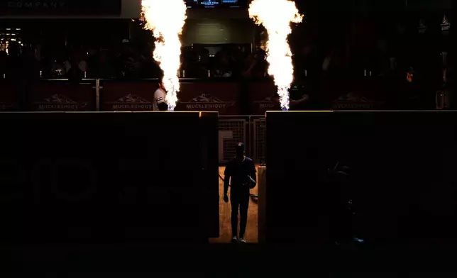 Seattle Mariners relief pitcher Matt Brash takes the field during the eighth inning of a baseball game against the Colorado Rockies, Thursday, Sept. 25, 2025, in Seattle. (AP Photo/Ryan Sun)