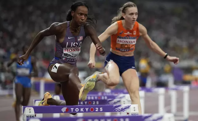 United States' Dalilah Muhammad competes in the women's 400 meters hurdles heats at the World Athletics Championships in Tokyo, Wednesday, Sept. 17, 2025. (AP Photo/Louise Delmotte)