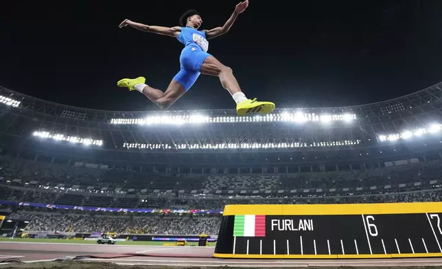 Italy's Mattia Furlani competes in the men's long jump final at the World Athletics Championships in Tokyo, Wednesday, Sept. 17, 2025. (AP Photo/Ashley Landis)