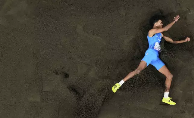 Italy's Mattia Furlani makes an attempt during the men's long jump final at the World Athletics Championships in Tokyo, Wednesday, Sept. 17, 2025. (AP Photo/Bernat Armangue)
