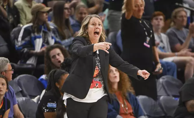 Minnesota Lynx head coach Cheryl Reeve works the sidelines during their game against the Phoenix Mercury in the first half of Game 1 of a WNBA basketball playoff semifinals series Sunday, Sept. 21, 2025, in Minneapolis. (AP Photo/Craig Lassig)