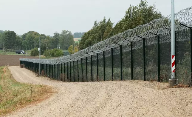 A border fence between Estonia and Russia is seen near Vinski, Estonia, Monday, Sept. 15, 2025. (AP Photo/Hendrik Osula)